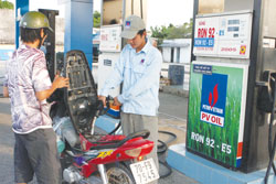 Petrol prices cut as world oil markets cool down