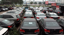 Automakers back rigid import law