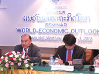 Lao economy must weather storms of global integration: economist