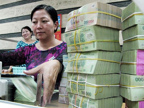 Central bank promises to reduce bad debts in 2013