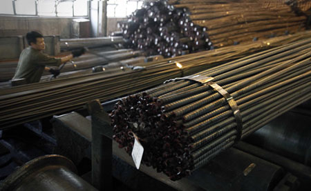 Steel giant reports large losses in first half
