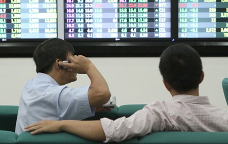 Shares slide as trading tumbles