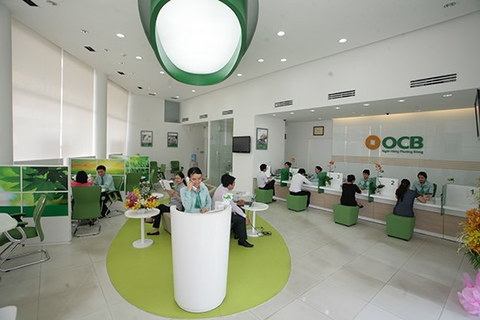 Vietcombank sells out OCB stake at auction