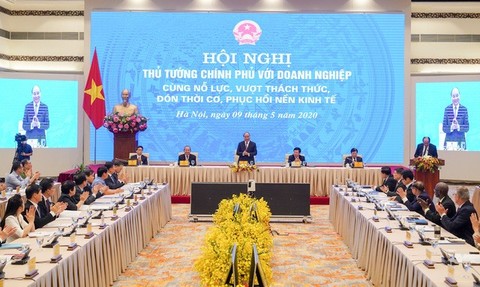 PM Phuc tells Viet Nam to restart the economy
